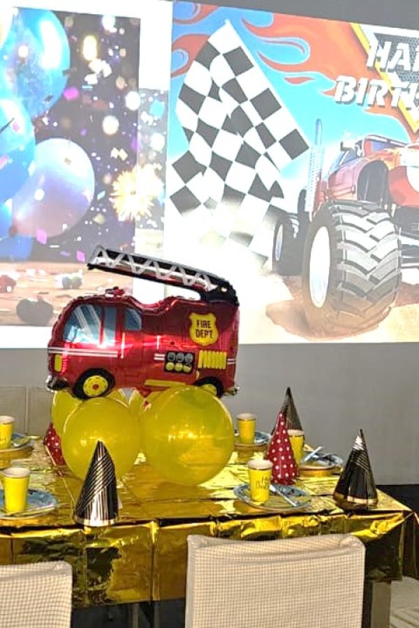 Themed party room decor at Ultra World, featuring bold red, yellow, and black colours, creating a playful and inviting atmosphere for celebrations.